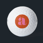 Pelotas De Golf Monograma moderno Letra inicial rosa y Naranja<br><div class="desc">Añade un toque de color a tu juego con este diseño monocasco moderno y elegante que presenta un comienzo audaz en rosa vibrante y naranja. El monograma brillante se distingue del diseño limpio, haciendo que estas bolas de golf sean perfectas para los jugadores que aman un toque sutil pero elegante....</div>