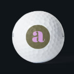 Pelotas De Golf Monograma retro único ondulado de aceitunas y lino<br><div class="desc">Estas únicas bolas de golf cuentan con un sencillo pero audaz monograma inicial en los colores de oliva y lila. La tipografía de inspiración retro añade un toque de estilo vintage, haciendo de estas pelotas de golf perfectas para los jugadores que aman un look personalizado y elegante. Ideal para aquellos...</div>