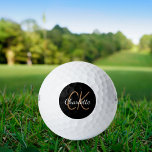 Pelotas De Golf Nombre minimalista de las iniciales del monograma<br><div class="desc">Fondo negro,  texto dorado y blanco. Personalice y agregue sus iniciales y nombre de monograma. Tanto para él como para ella. El nombre está escrito con una escritura de estilo con letras a mano moderna.</div>