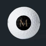 Pelotas De Golf Personalizado Monograma Oro Negro Nombre de guión<br><div class="desc">Personalizado Monograma Oro Negro Elegante Script Nombre Bolas de Golf Personalizadas</div>
