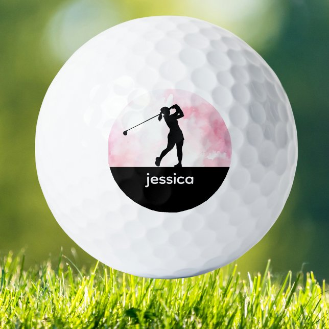 Pelotas De Golf Personalizado Woman Golf Balls (Chic pink watercolor golf ball with woman golfer design, custom monogram, and stylish feminine flair)