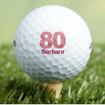 Pelotas De Golf Pink Checkered 80th Birthday Golfer de 80 años<br><div class="desc">Pink Checkered 80th Birthday Golfer 80 Years Old Golf Balls. Haz una declaración sobre el verde con esta audaz bola de golf de 80 años, con un patrón rosado de cuadros "80" y nombre de personalizable. Perfecto para las amantes del golf con un fuerte sentido del estilo, este diseño único...</div>
