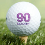 Pelotas De Golf Purple 90th Birthday Golfer Gift 90 Years elegante<br><div class="desc">Purple 90th Birthday Golfer Regalo 90 Years elegantes Golf Balls. ¡Celebra un cumpleaños 90 con estilo y elegancia! Esta pelota de golf personalizada incluye un "90" en un sofisticado paisley violeta, acompañado por un nombre de personalizable. Perfecto para las amantes del golf, que aprecian un diseño refinado, este toque de...</div>