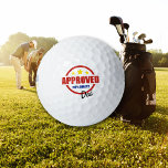 Pelotas De Golf Quality Approved Dad<br><div class="desc">This golf ball for Dad features a vintage type red and blue stamp image that says "Approved 100% Quality Dad" below three gold stars. Your custom text is in black at the bottom right of the approval stamp image. The image and text are placed on a white background. Perfect for...</div>
