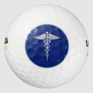 Pelotas De Golf Símbolo médico cromado como Caduceus sobre azul ma