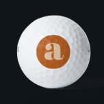 Pelotas De Golf Simple Boho Terracotta Negrita Monograma Retro Ini<br><div class="desc">Eleve su juego de golf con este sencillo pero elegante diseño de terracota inspirado en boho. Con una audaz tipografía retro, estas pelotas de golf le aportan un ambiente único y honesto al campo. Perfecto para los jugadores que aprecian el diseño minimalista con un toque de estilo vintage. Ya sea...</div>