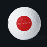 Pelotas De Golf Tipografía de script personalizada Nombre Navidade<br><div class="desc">Celebra la temporada de fiestas con estilo con estas pelotas de golf con un nombre personalizado en elegante tipografía de escritura, ambientada con un clásico fondo rojo Navidad. Perfecto para los golfistas que quieran añadir un toque festivo a su juego o como un regalo de vacaciones. El diseño audaz y...</div>
