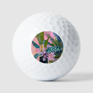 Pelotas De Golf Tropical pink flamingos set against lush green