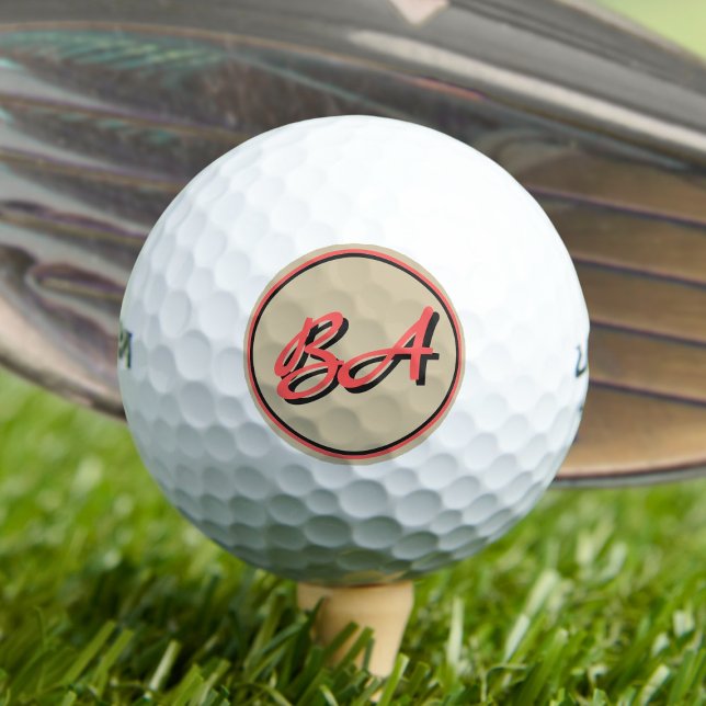 Pelotas De Golf Tus inicios en rojo y negro en arena (Subido por el creador)