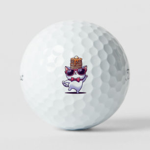 Pelotas De Golf Un gato gracioso que balancea la pila de crepes