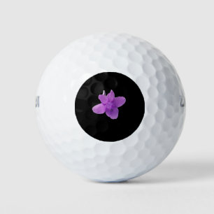 Pelotas De Golf Violeta filipina sobre negro