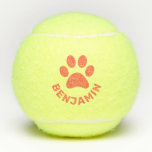 Pelotas De Tenis Naranja personalizado Paw Imprimir Mascota Nombre<br><div class="desc">Una pelota de tenis impresa en personalizado con el nombre de su mascota y una huella de pata naranja. Haga clic en "personalizar más adelante" para cambiar los colores del diseño.</div>