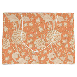 Peonies y tulipanes salvajes en la bolsa de regalo