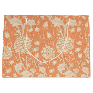 Peonies y tulipanes salvajes en la bolsa de regalo