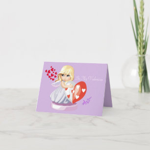 Pequeña AngelGirl sosteniendo el corazón tarjeta d