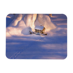 Pequeña casa en el imán flexible de la nieve