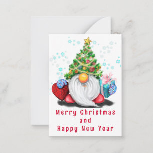 Pequeña Gnome lindo con tarjeta de Navidades de regalo