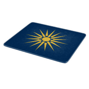 Pequeña tabla de cortar de vidrio con la bandera d