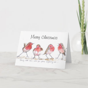 Pequeña tarjeta de Navidad vivaz de los petirrojos