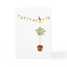 Pequeño árbol de navidad rojo del pájaro
