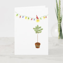 Pequeño árbol de navidad rojo del pájaro