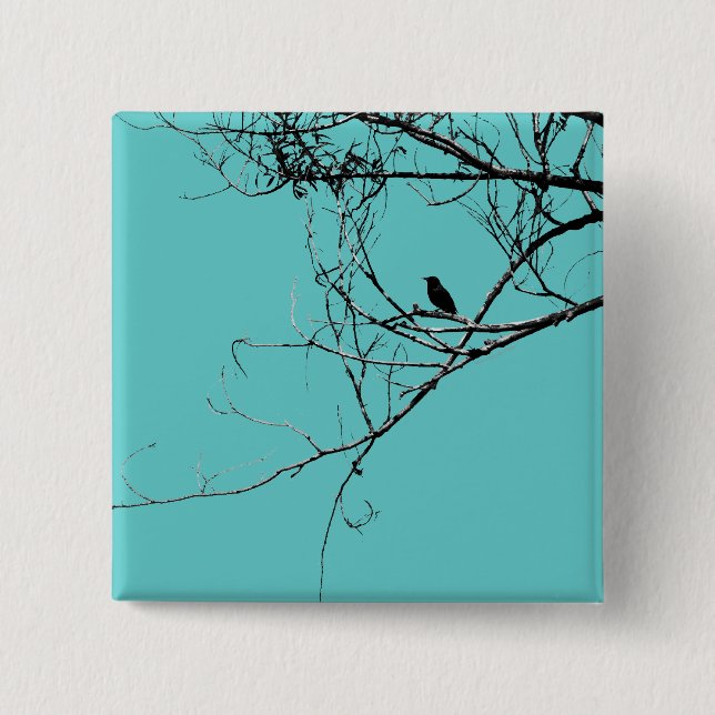 Pequeño botón negro de pájaro (Anverso)