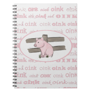 Pequeño cuaderno rosado del cochinillo
