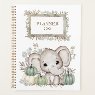 Pequeño elefante lindo con planificador de calabaz