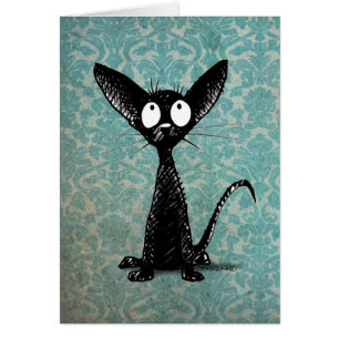 Pequeño gato negro divertido en el damasco del
