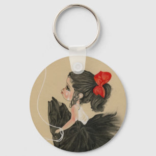 Pequeño llavero triste afligido del chica del