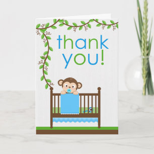 Pequeño mono en una carta de agradecimiento a un c