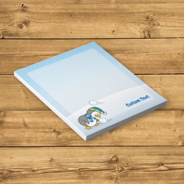 Pequeño pingüino recibiendo una libreta de bola de (Subido por el creador)