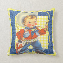 Pequeño vaquero retro occidental con la almohada