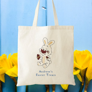 Pequeños conejitos niños de Pascua Tratan la bolsa