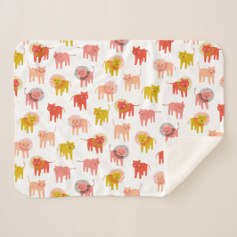 Pequeños leones Sherpa bebé, una manta en un desie