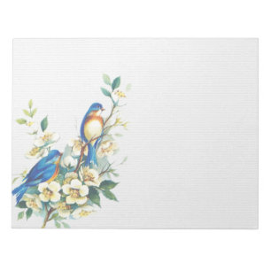 Pequeños pájaros azules en la libreta de la rama