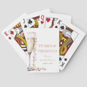Perlas doradas y cartas clásicas de juego Prosecco