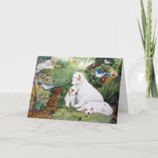 Perritos de Clumber en la tarjeta de felicitación
