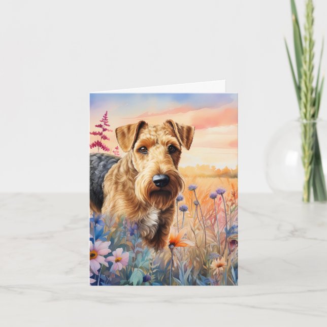Perro Airedale Terrier en una pradera de flores si (Anverso)