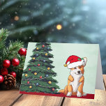 Perro de árbol de Navidad Corgi con sombrero de co<br><div class="desc">Este hermoso perro de Pembroke Welsh Corgi tiene la cabeza inclinada dentro de un lindo gorra de Santa Claus. El cachorro está sentado frente a un árbol de Navidad bonito decorado con adornos coloridos. Una preciosa tarjeta de vacaciones con un maravilloso dibujo de mi perrito favorito.</div>