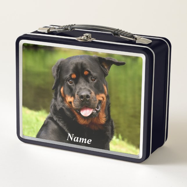 Perro de cachorro negro y tan rotuiler (Anverso)