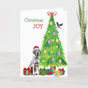 Perro de danés, pájaro y árbol de Navidad