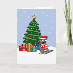 Perro de ganado australiano y árbol de Navidad