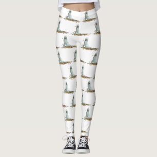 Perro de Labradoodle en hojas de leggings femenina