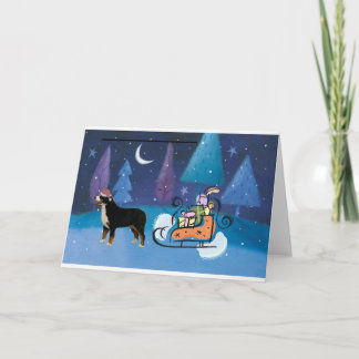 Perro de montaña de Bernese y tarjeta del trineo