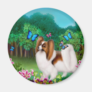 Perro de Papillon en imán redondo del jardín