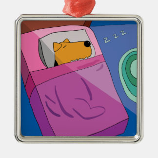 Perro de perrito en el ornamento de la cama