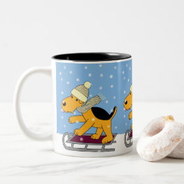 Perro de perrito en una taza del trineo