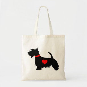 Perro del escocés del amor con la bolsa de asas