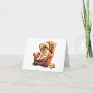 Perro en la silla con tarjeta en blanco de libros